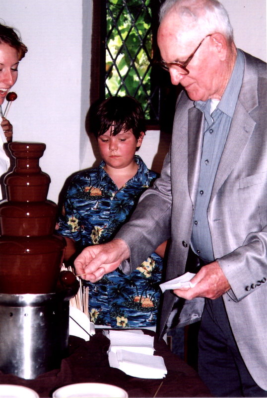 Dillon and Grandpa Scully at the Chocolate Fountain